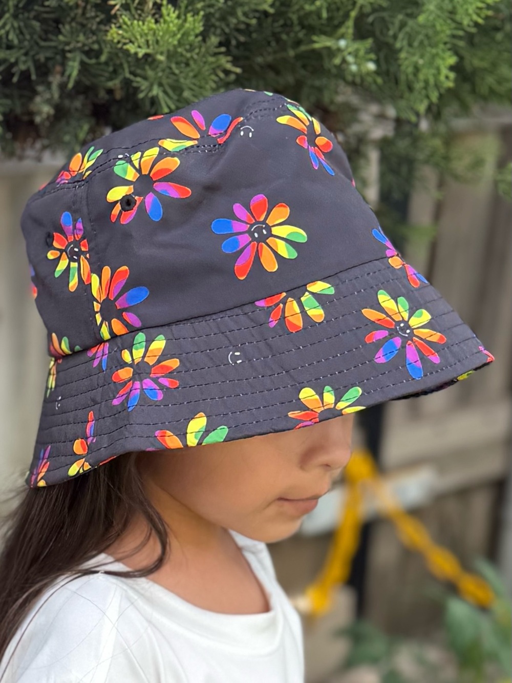 Kids Claire's Black Bucket Hat with Rainbow Floral Pattern